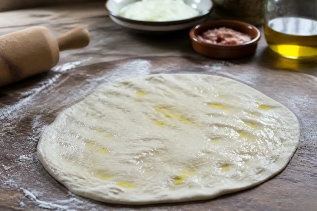 Pâte à tarte flambée : recette traditionnelle fine et croustillante